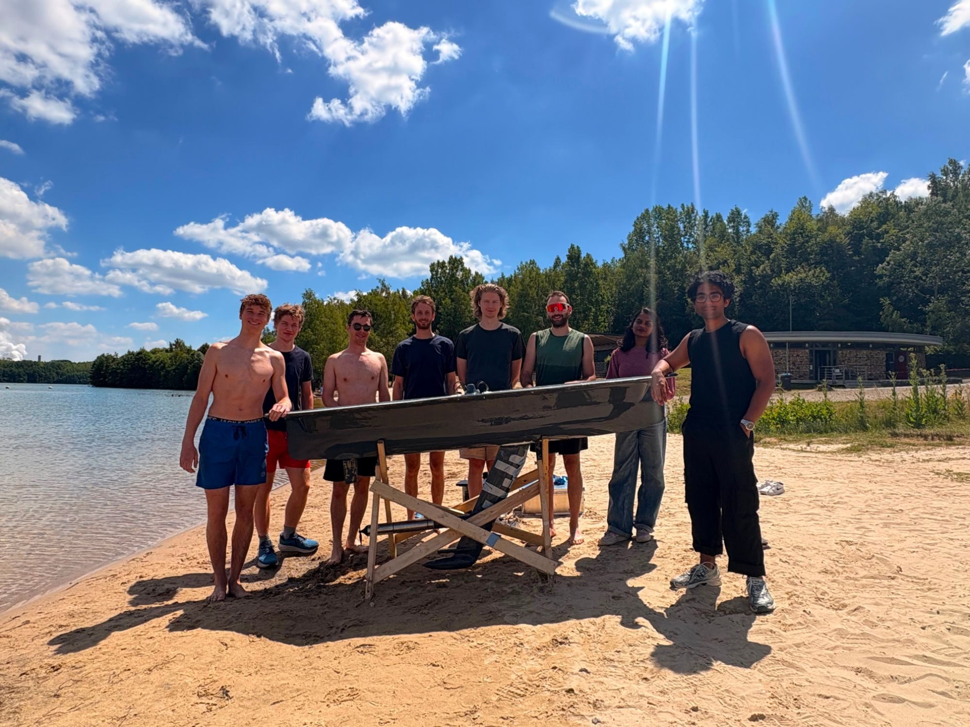 The Triton team with the boat on the shore of Lake Blausteinsee