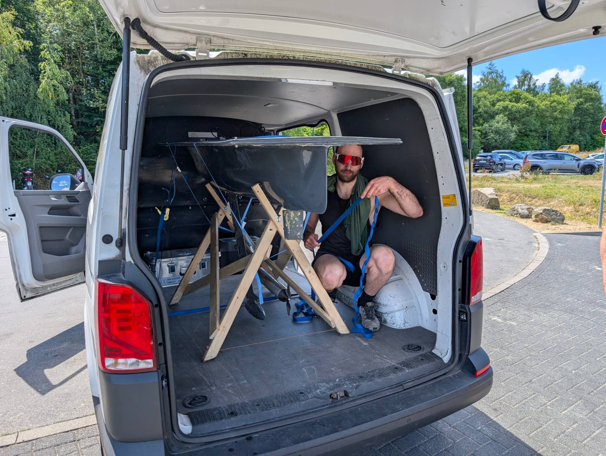 The boat secured in the van for transport to Lake Blausteinsee